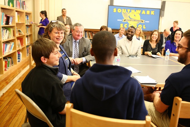 Community Schools Director Susan Gobreski and Mayor Kenney listen to students at a community schools round table at Southwark School in March 2016.