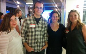 Photo caption - Picture of the Department of License and Inspections staff who attended the hackathon to answer questions about the data and provide support for projects using it. From left to right - Emily Suarez, Daniel Interrante, Rebecca Swanson, and Shannon Holm.