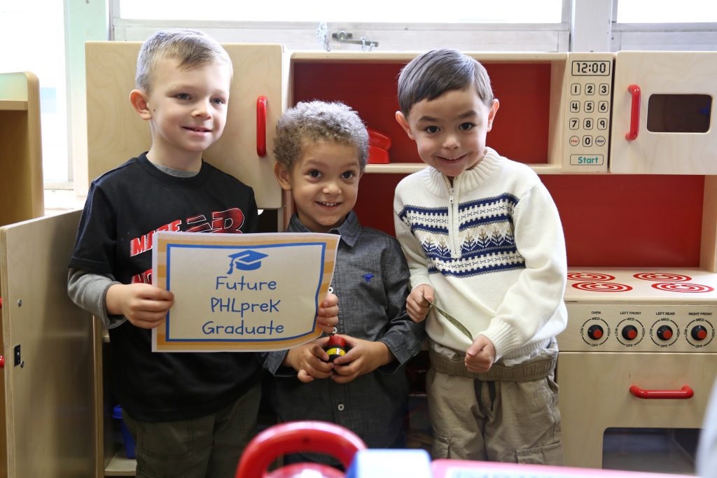 Three future PHLpreK graduates pose for a photo