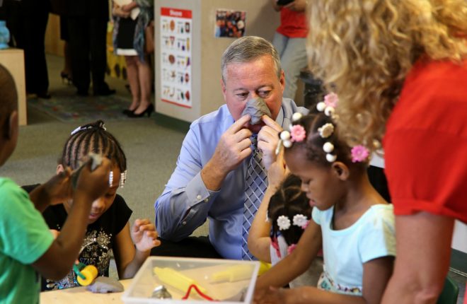 Mayor Kenney makes a play dough nose while visiting Elwyn, a PHLpreK provider.