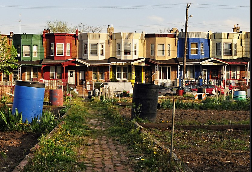 Rowhomes with gardens in foreground