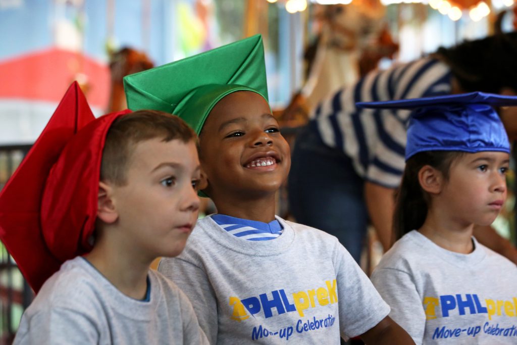 A PHLpreK student smiles during the PHLpreK Move Up Day