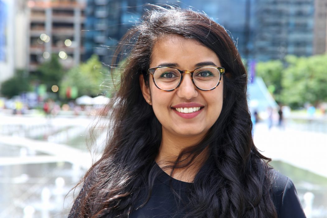 Fae Ehsan smiles on a sunny day at City Hall's Dilworth Park.