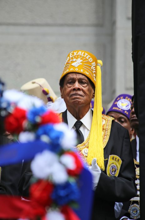 A member of a local civic group attends the Octavius V. Catto monument dedication 