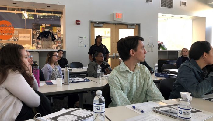 classroom of city employees listening to a lecture