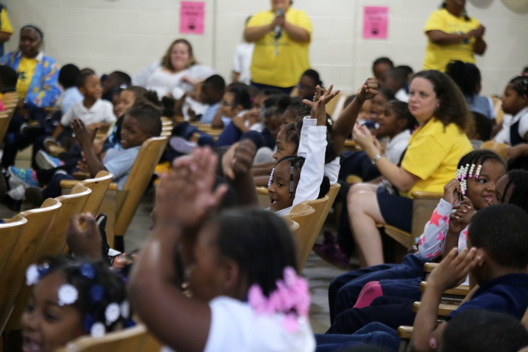 Students cheer during the PSSA and Keystone results celebration at McMichael School