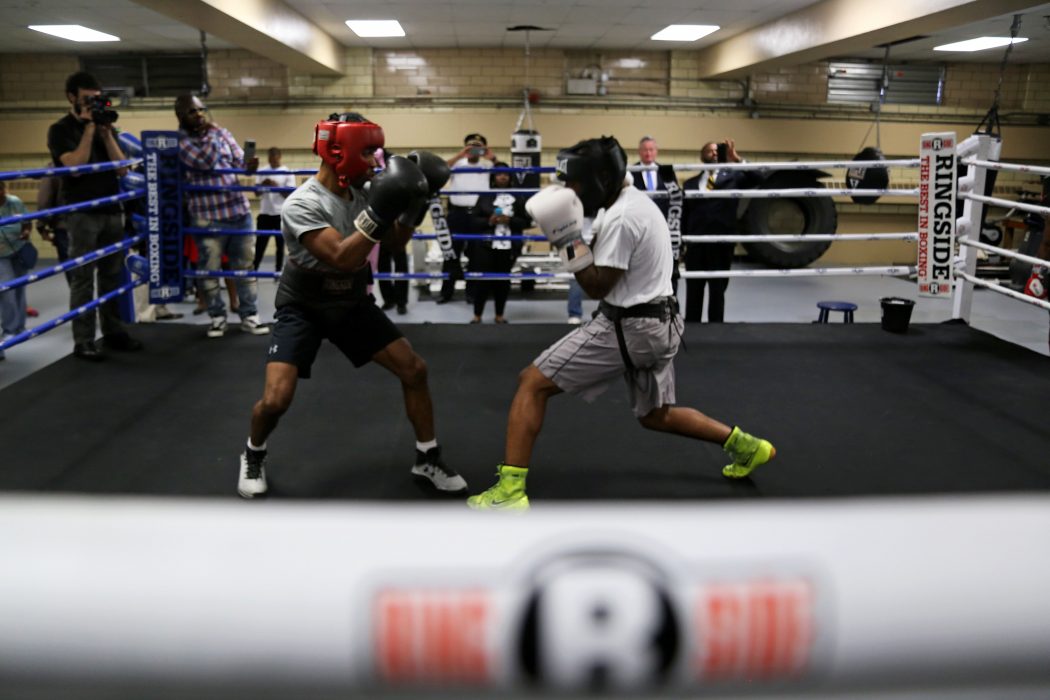 Youth spar after the ribbon cutting of the new boxing gym at Shepard Recreation Center 