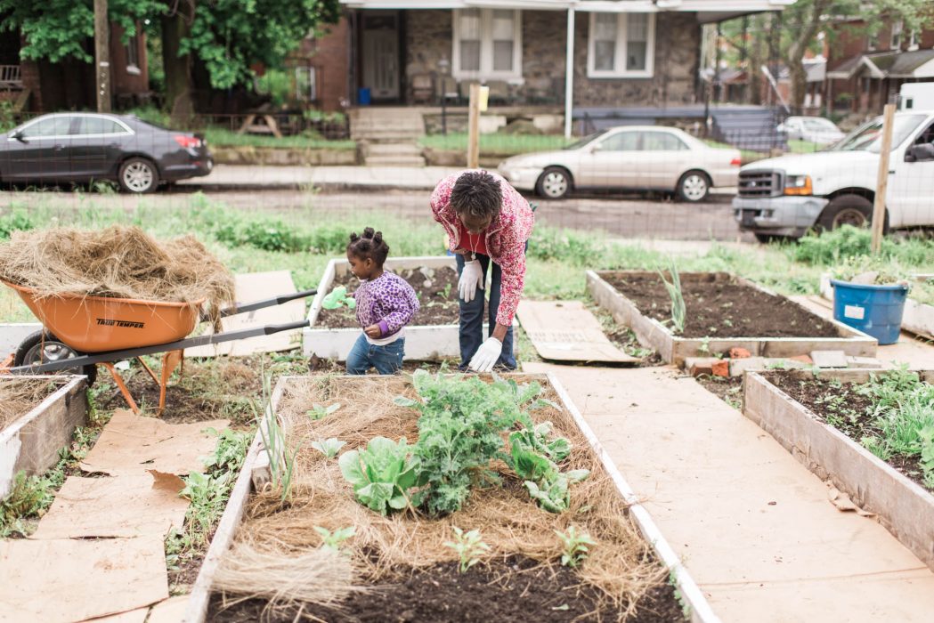 Mom and daughter gardening