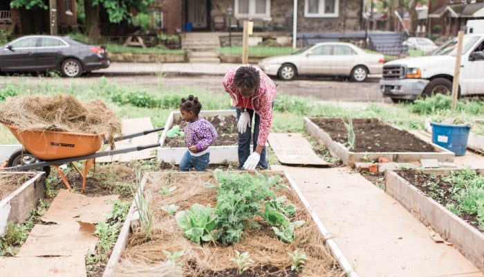 Mom and daughter gardening