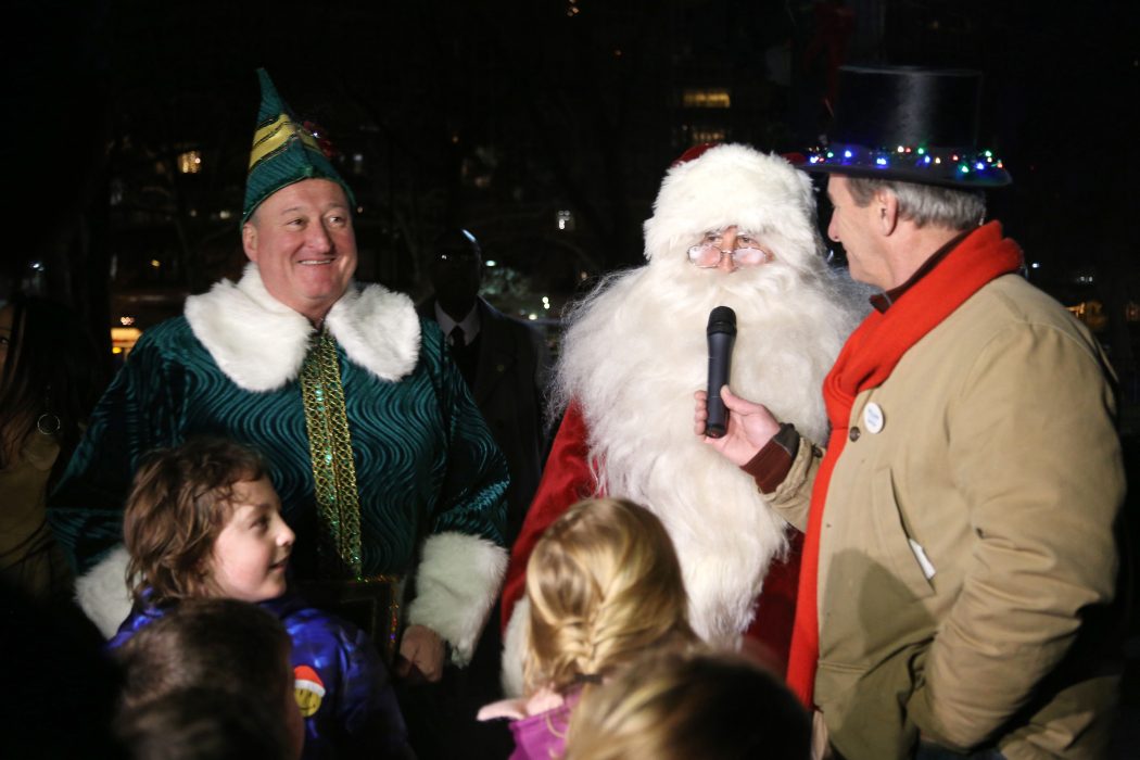 Buddy the Elf and Santa visit Franklin Square Park on December 19.