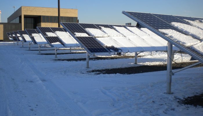 solar panels covered in snow