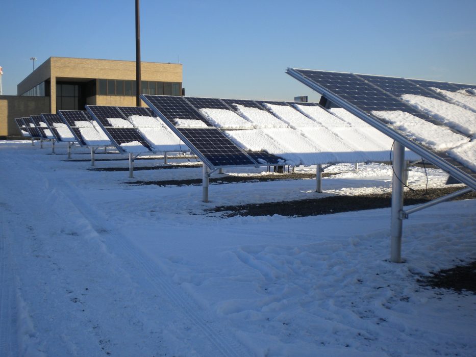 solar panels covered in snow