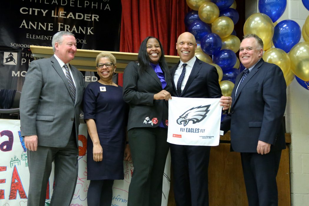 Kala Johnstone, principal of J.B. Kelly School, Superintendent Dr. Hite, Mayor Kenney and representatives from the SRC, show their Eagles pride during the Philadelphia School District Progress Event at Potter-Thomas Elementary School on January 29.