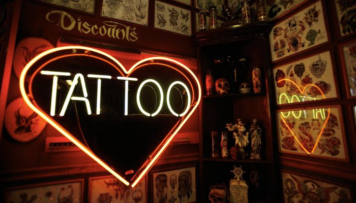 Neon sign that says Tattoo
