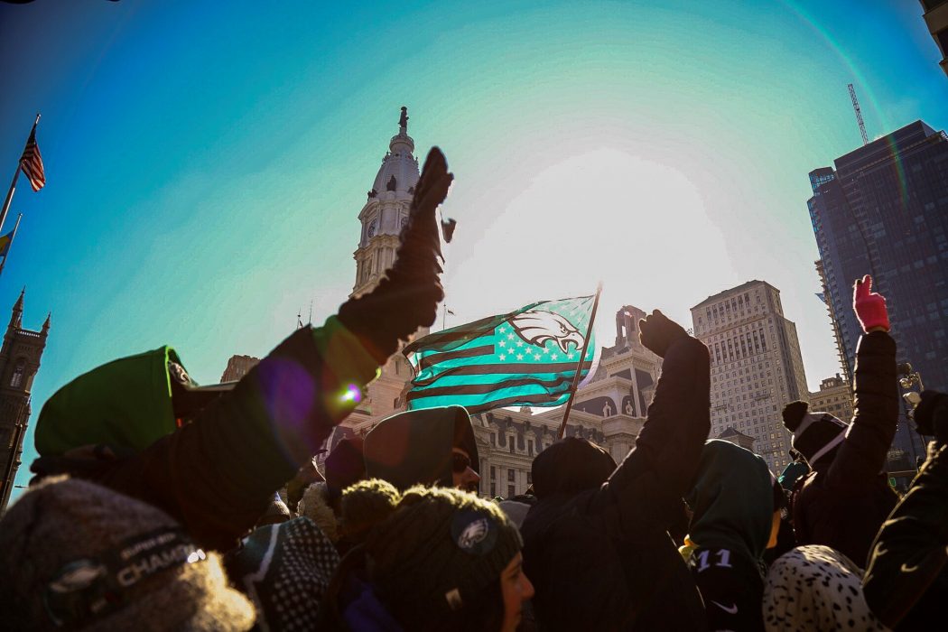 Fans cheering on the Eagles Parade near City Hall