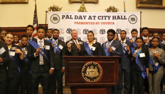 Mayor standing with PAL students.