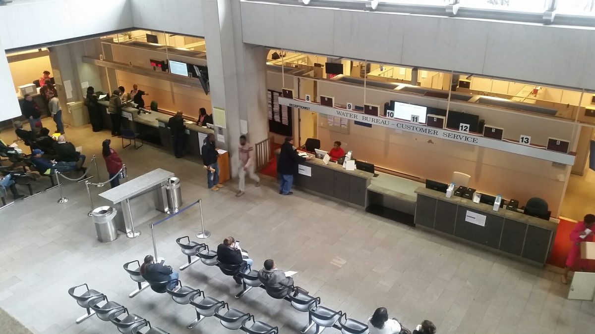 Customers in the concourse level of the Municipal Services Building