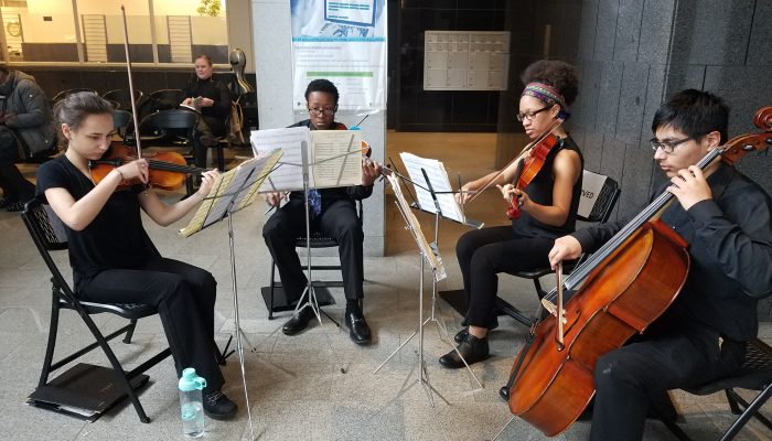 A quartet from the Philadelphia High School for Creative & Performing Arts serenade taxpayers at the Municipal Services Building