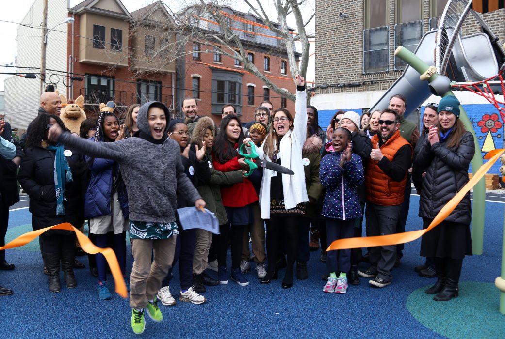 Students and staff at E.M. Stanton School cut the ribbon their newly redeveloped schoolyard on February 1. 
