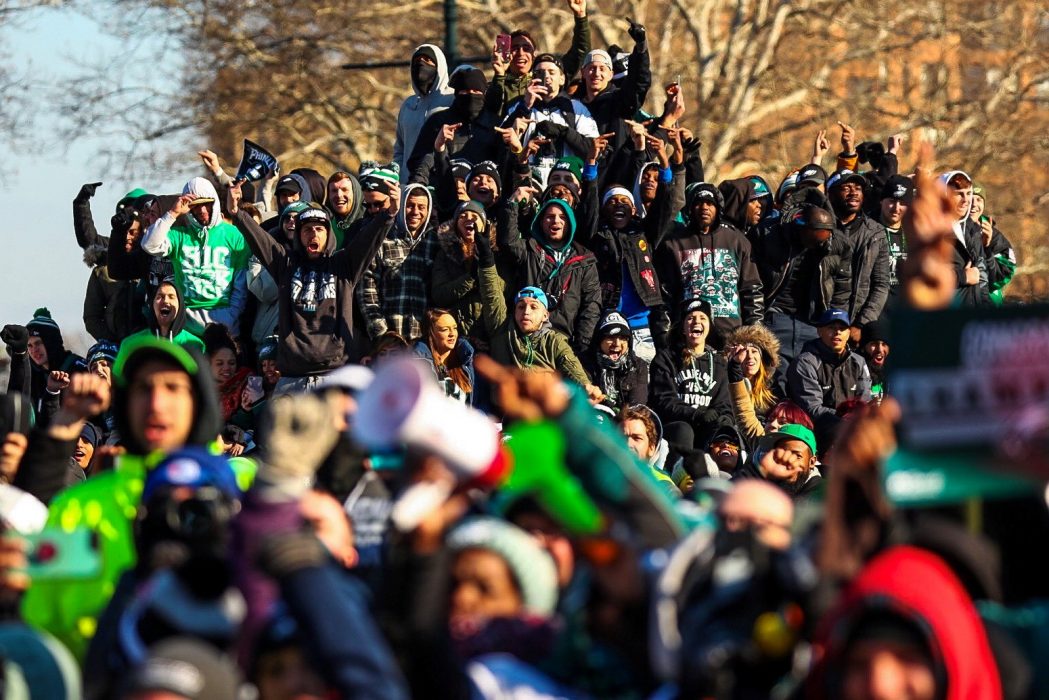 Fans celebrate the Philadelphia Eagles Super Bowl victory during a ceremony at the Philadelphia Museum of Art following the parade on February 8.