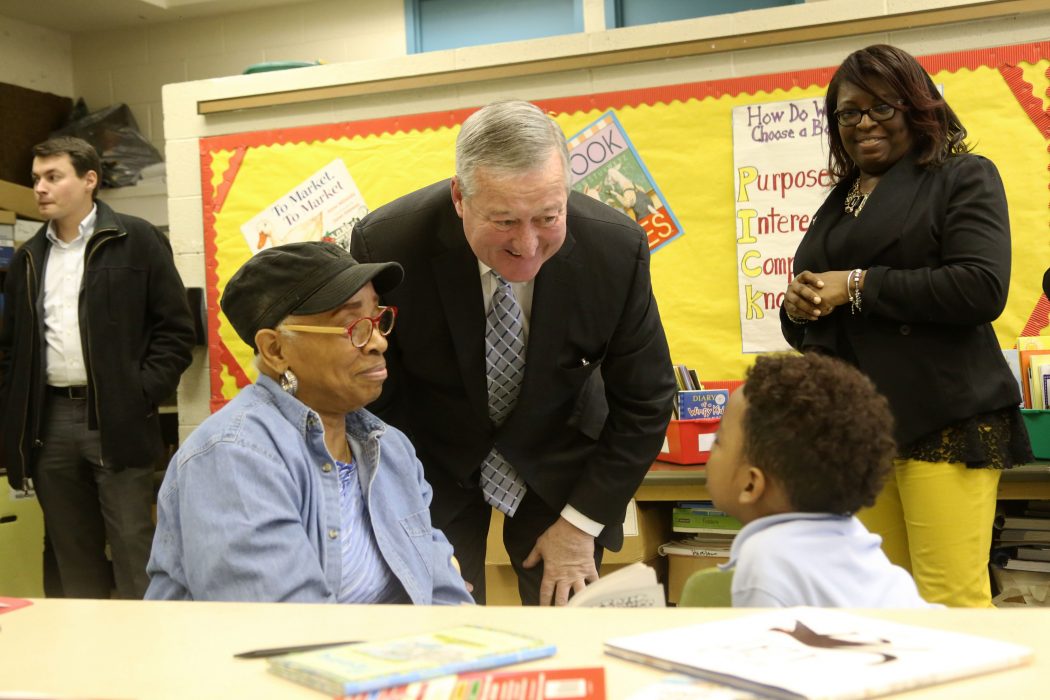 Mayor Kenney talks to a student at the Philly Reading Coaches program.