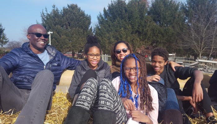 Angela McIver with her familhy on a hayride.