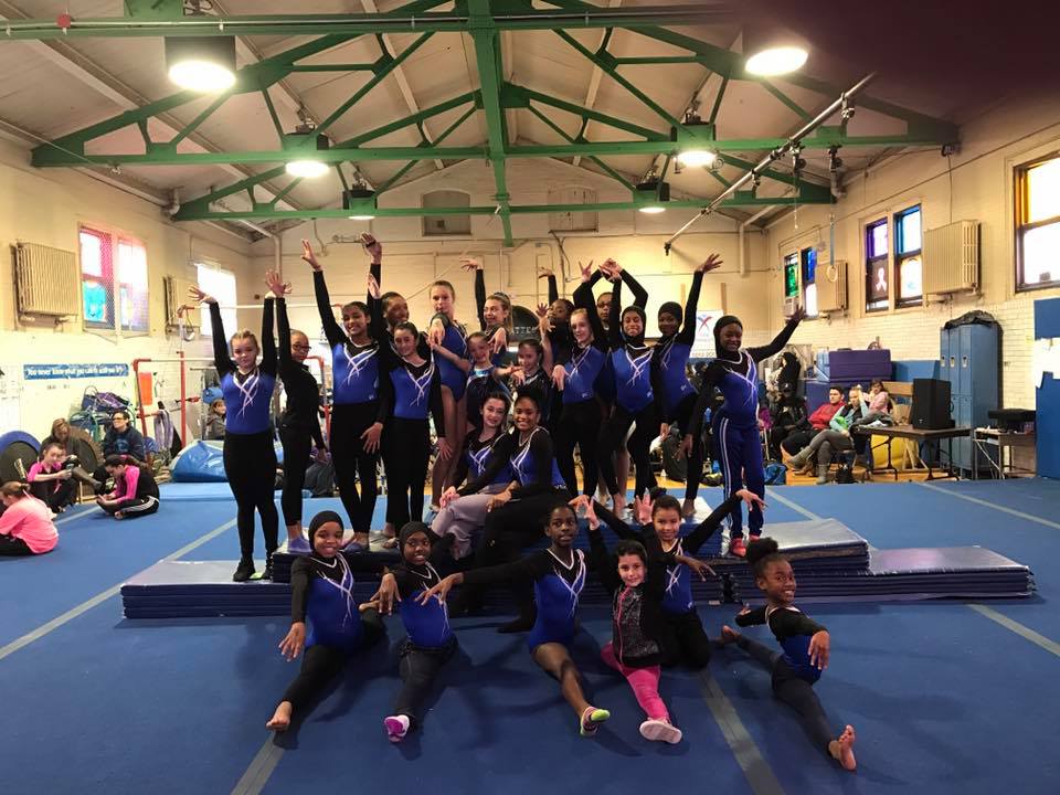 Vare gymnasts in their competition uniforms