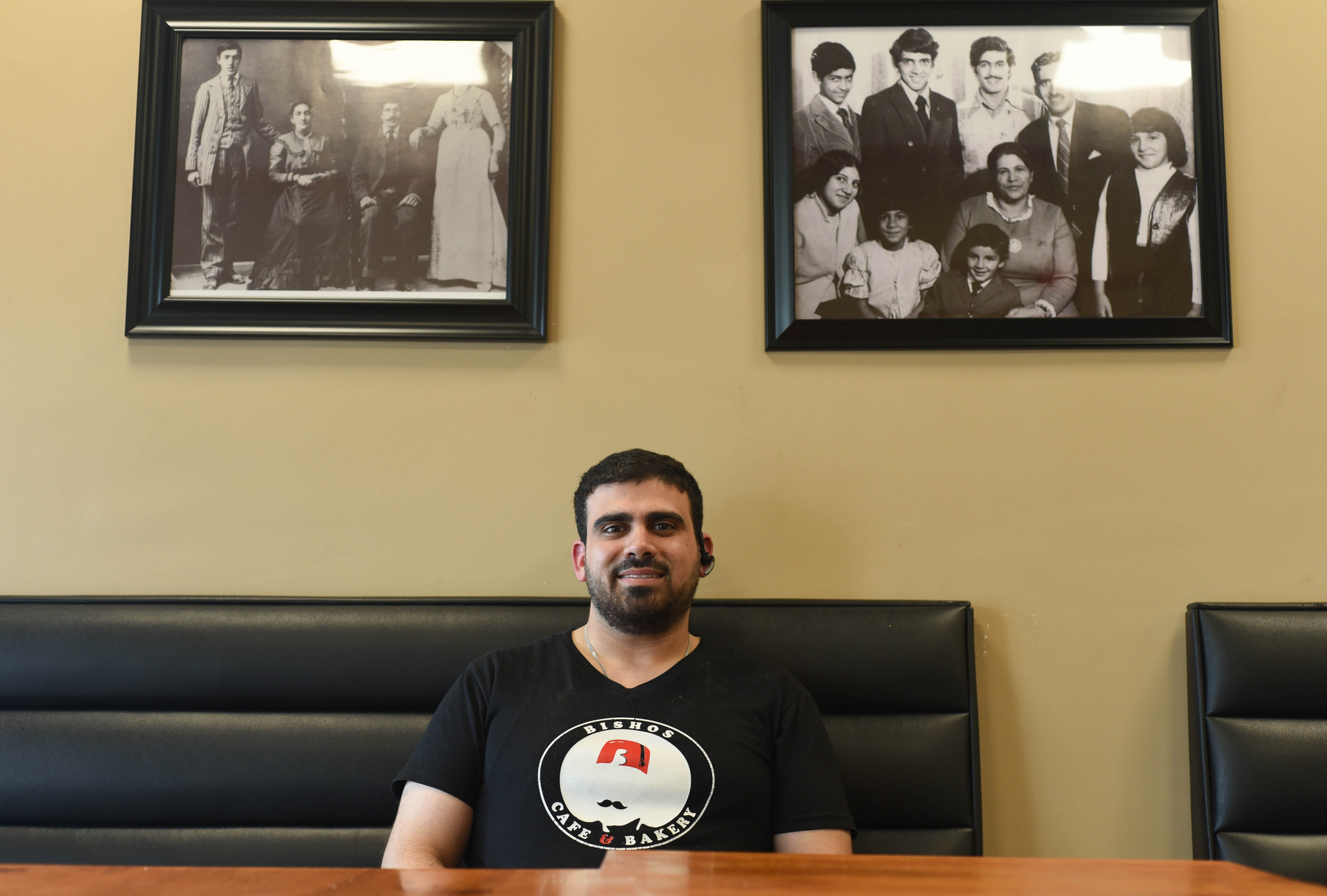 A man sitting in Bisho's Cafe & Bakery