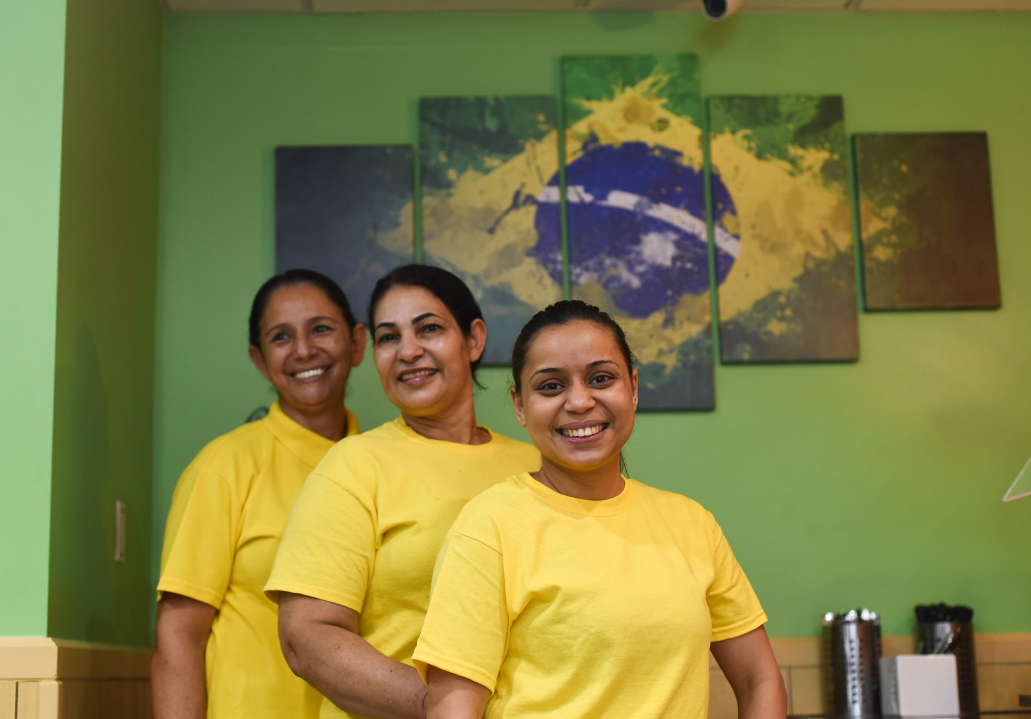 Three women standing in Villa Brazil