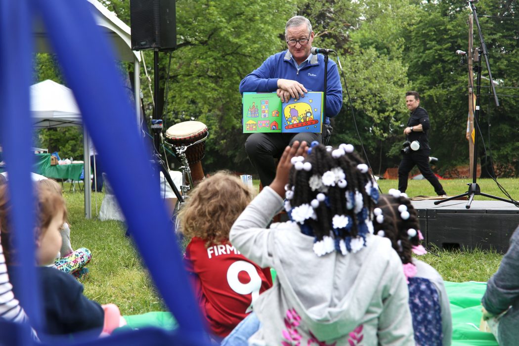 Mayor Kenney reads “Be Who You Are” during Philadelphia Literacy Day at Smith Memorial Playground.