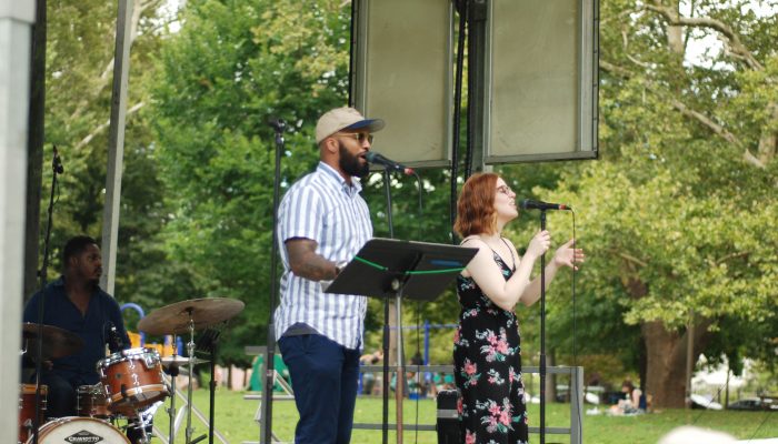 A band performing in a park