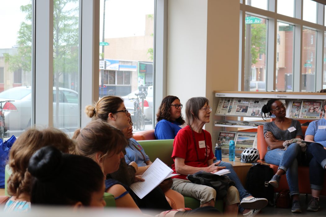 Community members sit together and discuss thoughts on education in Philadelphia
