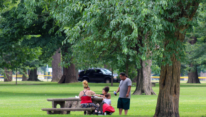 A family picnicking in Hunting Park