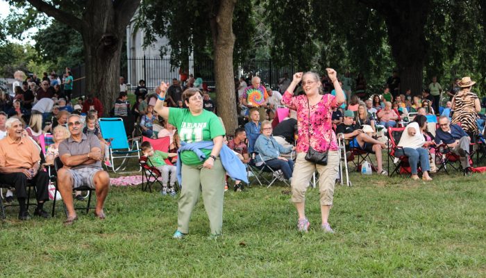 Two women dancing in Gorgas Park