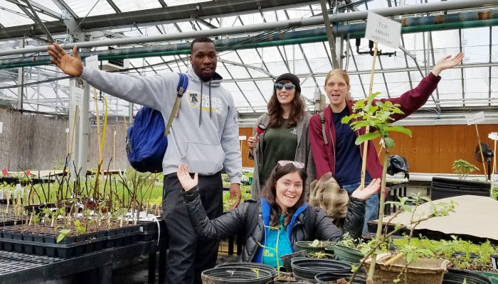 Four Farm Philly staff members posing at the Horticulture Center