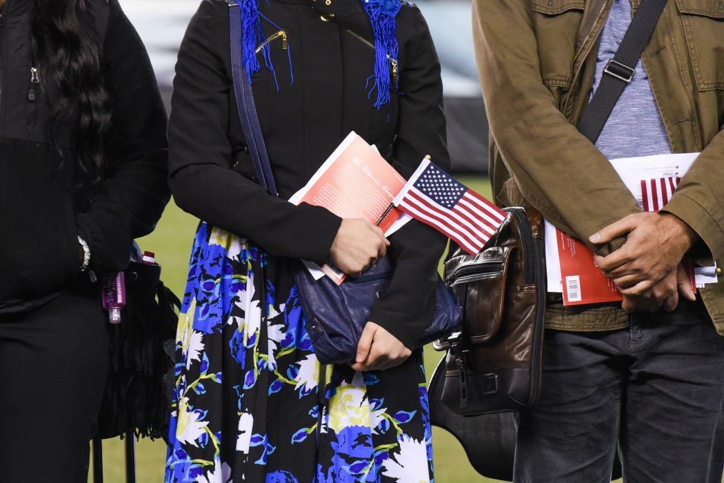 women-holding-american-flag