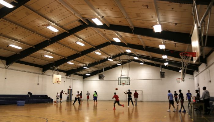 people playing basketball in Olney's gymnasium