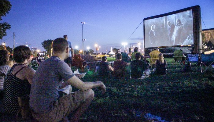 Movie watchers outside in Eakins Oval