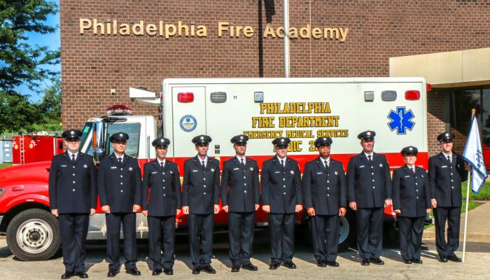 Paramedics in front of ambulance