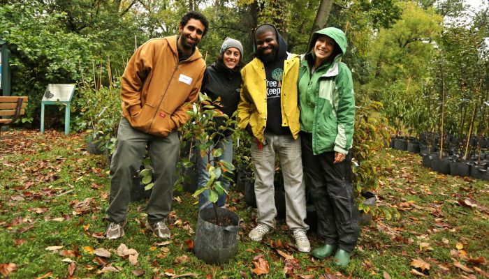 TreePhilly staff posing near a tree