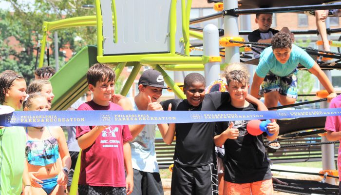 Children at the Von Colln Playground ribbon cutting event