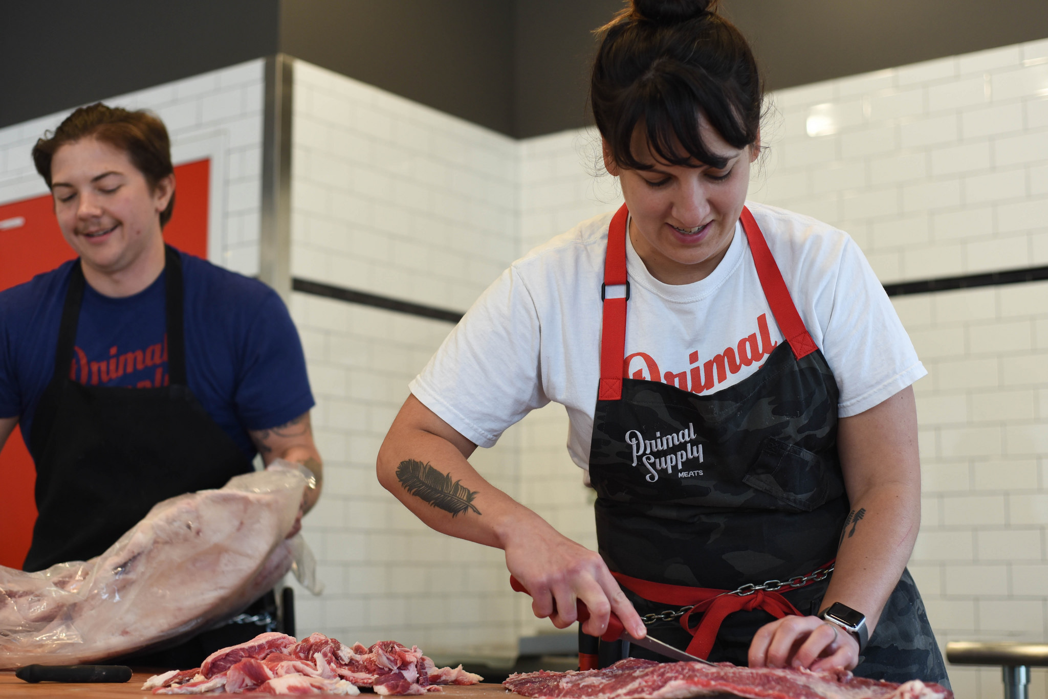 Heather Thomason of Primal Supply Meats preparing meat in her South Philadelphia butcher shop.