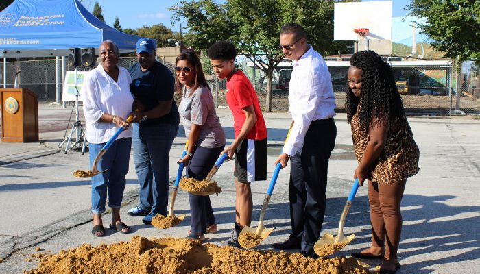City officials and residents break ground