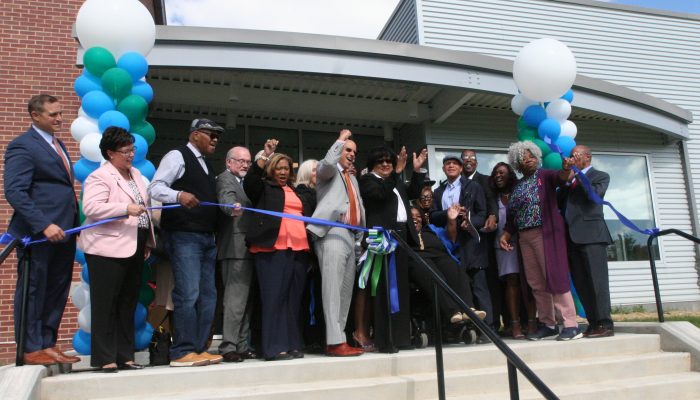 A ribbon cutting at a community center