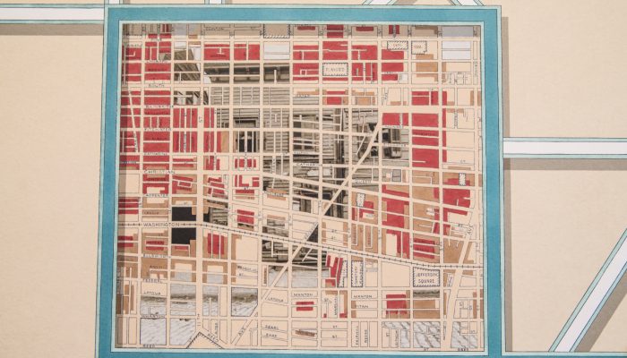 The interactive mural along the walls at the new City Archives; it shows an old street grid map of Passyunk Avenue from Reed to South Street.