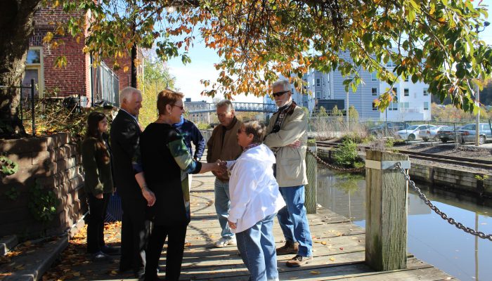 A crowd gathers after the DCNR Announcement at the Manayunk Towpath