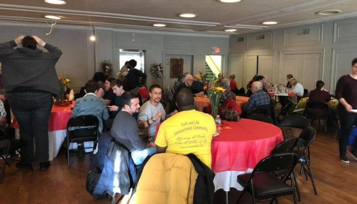 people talking around a table