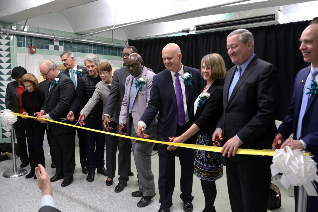 Mayor Kenney, city officials, representatives from Project Home and SEPTA and Jon Bon Jovi cut the ribbon for the opening of Hub of Hope on January 30. 