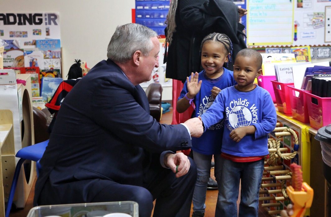 Mayor Jim Kenney shakes hands with PHLpreK studnets at Your Child's World