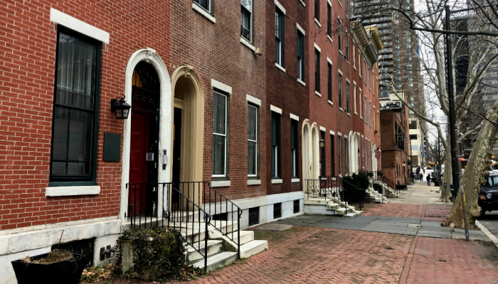 Row homes on a street in Center City, Philadelphia